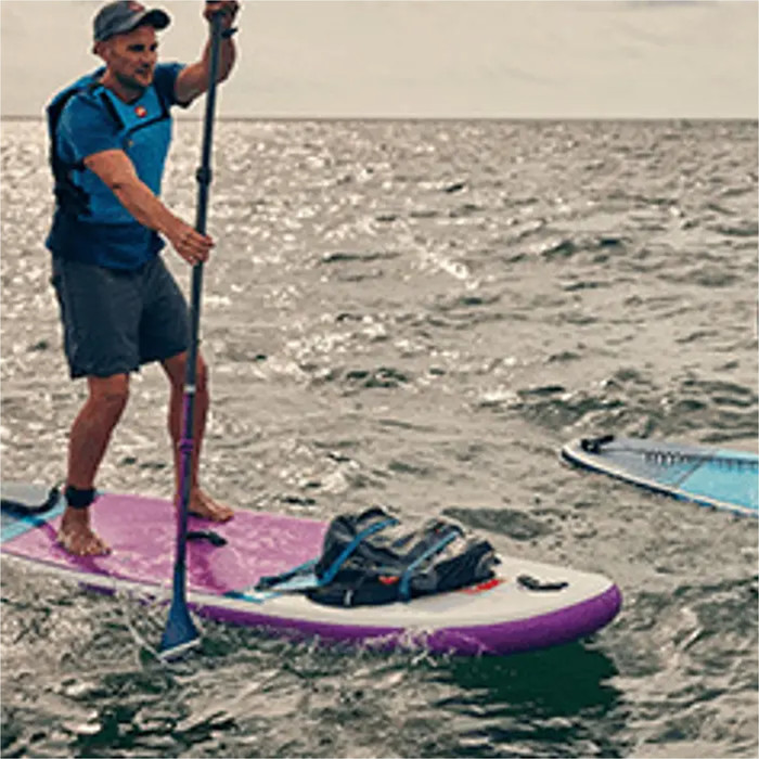 2023 Red Paddle Co 10'6 Ride Stand Up Paddle Board, taske, padler, pumpe og snor - Prime Purple-pakke